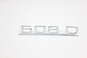 Emblema '608 D' Original (Metal) Cromado