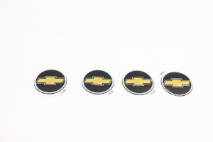 Emblema Calota Tracker 01/09 Preto/Dourado 55mm