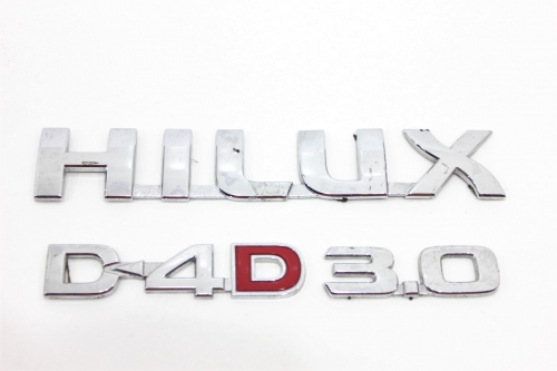 Emblema Logo Porta Jg Hilux 05/15 Usado (996)