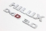 Emblema Logo Porta Jg Hilux 05/15 Usado (993)